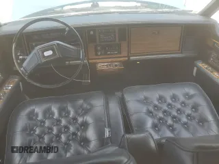 1985 Cadillac Seville z VIN 1G6KS6985FE825187, wystawiony jako Copart lot #54197375 z przebiegiem 2706 mil mil oraz Tytuł czysty. Historia ofert i sprzedaży dostępna na DreamBid. Obrazek 8.