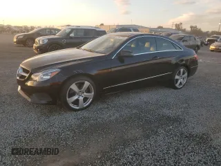 2014 Mercedes-Benz E 350 with VIN WDDKJ5KB4EF277889, listed as a Copart auction lot 87507305 with 106,275 mi miles and Salvage Title. Bid and sale history available at DreamBid. Image 1.
