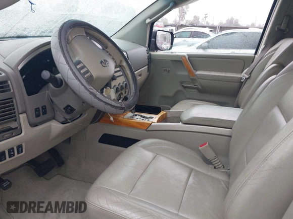 2005 Infiniti QX56 with VIN 5N3AA08AX5N810084, listed as a IAAI auction lot 41862041 with 168,958 mi miles. Bid and sale history available at carsss.com. Image 5.
