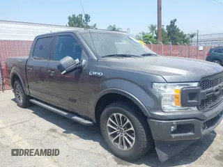 2018 Ford F-150 XL with VIN 1FTEW1CPXJKD56562, listed as a IAAI auction lot 42588371 with 137,496 mi miles and . Bid and sale history available at DreamBid. Image 18.