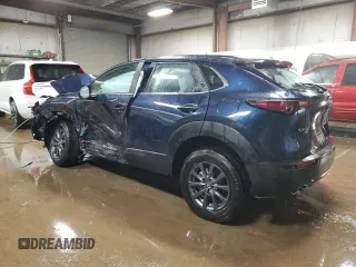 2023 Mazda CX-30 S with VIN 3MVDMBAM1PM565897, listed as a Copart auction lot 52426115 with 19,648 mi miles and Salvage title. Bid and sale history available at DreamBid. Image 2.