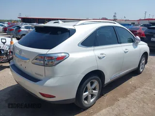 2012 Lexus RX with VIN JTJZK1BA2C2414593, listed as a IAAI auction lot 41929541 with 101,808 mi miles and . Bid and sale history available at carsss.com. Image 4.