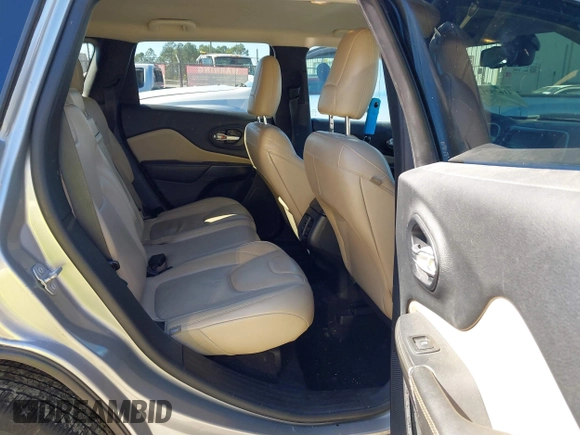 2016 Jeep Cherokee Limited with VIN 1C4PJLDB8GW239294, listed as a IAAI auction lot 41675712 with 140,491 mi miles. Bid and sale history available at carsss.com. Image 8.