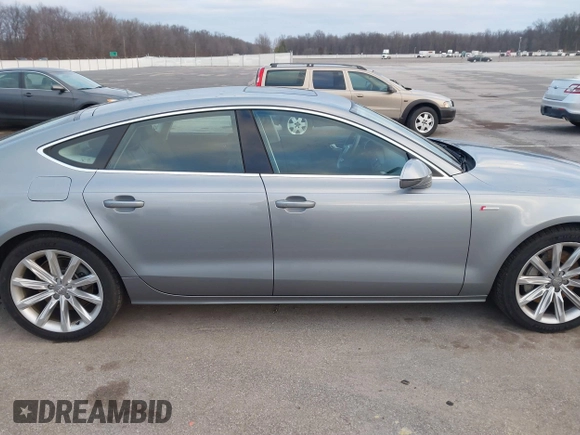 2014 Audi A7 Premium Plus z VIN WAUWGAFC9EN096702, wystawiony jako IAAI lot #41202201 z przebiegiem 103 893 mil mil oraz . Historia ofert i sprzedaży dostępna na DreamBid. Obrazek 13.