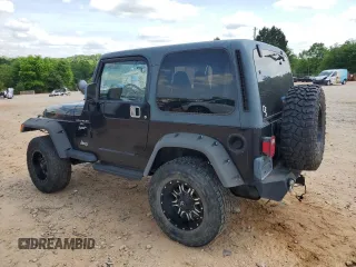 1999 Jeep Wrangler Sport with VIN 1J4FY19S9XP423684, listed as a Copart auction lot 55079455 with 149,756 mi miles and Salvage Title. Bid and sale history available at carsss.com. Image 2.
