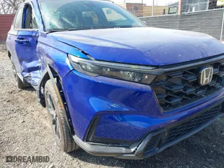 2025 Honda CR-V Hybrid Sport-L with VIN 5J6RS6H80SL011557, listed as a IAAI auction lot 41842463 with 1,711 mi miles. Bid and sale history available at carsss.com. Image 6.