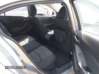 2014 Mazda 3 i Touring with VIN JM1BM1L70E1185972, listed as a IAAI auction lot 42005779 with 90,175 mi miles and . Bid and sale history available at DreamBid. Image 8.