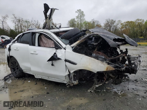 2022 Jaguar F-Pace S with VIN SADCJ2EX9NA702559, listed as a Copart auction lot 52077405 with Not provided miles and Salvage title. Bid and sale history available at DreamBid. Image 4.