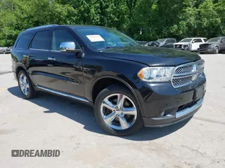 2013 Dodge Durango Citadel z VIN 1C4RDJEG6DC688209, wystawiony jako IAAI lot #42234617 z przebiegiem 171 597 mil mil oraz . Historia ofert i sprzedaży dostępna na DreamBid. Obrazek 1.