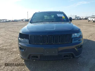 2018 Jeep Grand Cherokee Laredo E with VIN 1C4RJFAG4JC370502, listed as a IAAI auction lot 41342367 with 104,307 mi miles. Bid and sale history available at carsss.com. Image 13.