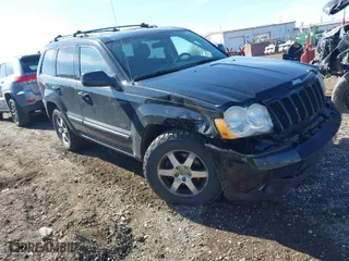 2008 Jeep Grand Cherokee Laredo with VIN 1J8GR48K78C147095, listed as a IAAI auction lot 41848539 with 118,812 mi miles. Bid and sale history available at carsss.com. Image 1.