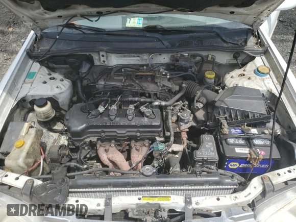 2002 Nissan Sentra GXE z VIN 3N1CB51A62L552428, wystawiony jako Copart lot #53680465 z przebiegiem 139 006 mil mil oraz Szkoda całkowita • Salvage title. Historia ofert i sprzedaży dostępna na DreamBid. Obrazek 11.