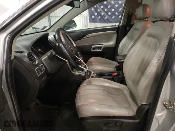 2012 Chevrolet Captiva Sport LTZ with VIN 3GNFL4E5XCS609095, listed as a Copart auction lot 77334734 with 163,078 mi miles and Salvage Title. Bid and sale history available at DreamBid. Image 7.