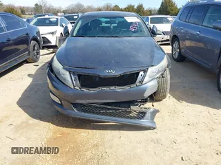2015 Kia Optima LX z VIN 5XXGM4A73FG364345, wystawiony jako IAAI lot #41598303 z przebiegiem 134 486 mil mil oraz . Historia ofert i sprzedaży dostępna na DreamBid. Obrazek 13.