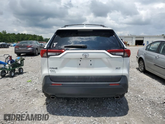 2024 Toyota RAV4 XLE Premium with VIN 2T3C1RFV5RW349729, listed as a Copart auction lot 59033195 with 10,524 mi miles and Salvage title. Bid and sale history available at DreamBid. Image 6.