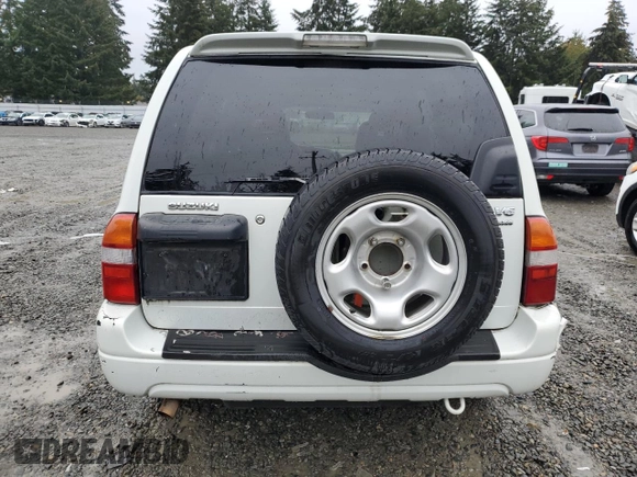 2002 Suzuki XL7 Standard z VIN JS3TX92V224107876, wystawiony jako Copart lot #78257934 z przebiegiem 142 177 mil mil oraz Czysty tytuł • Clean title. Historia ofert i sprzedaży dostępna na DreamBid. Obrazek 6.