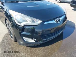 2012 Hyundai Veloster w/Black Int z VIN KMHTC6AD4CU078413, wystawiony jako IAAI lot #42611032 z przebiegiem 142 295 mil mil oraz . Historia ofert i sprzedaży dostępna na DreamBid. Obrazek 6.
