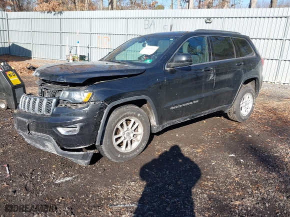 2018 Jeep Grand Cherokee Laredo E with VIN 1C4RJFAG4JC326631, listed as a IAAI auction lot 41191061 with 115,451 mi miles. Bid and sale history available at carsss.com. Image 17.