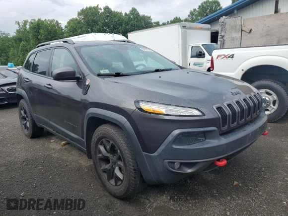 2015 Jeep Cherokee Trailhawk with VIN 1C4PJMBS0FW655167, listed as a Copart auction lot 64597165 with 193,779 mi miles and Clean title. Bid and sale history available at DreamBid. Image 4.