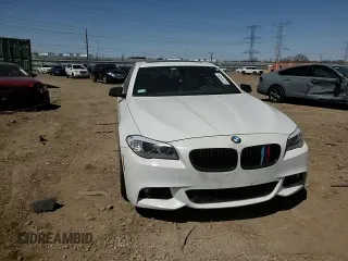 2013 BMW 5 Series 550i xDrive with VIN WBAFU9C52DDY71651, listed as a Copart auction lot 52156465 with 144,211 mi miles and Salvage title. Bid and sale history available at DreamBid. Image 11.