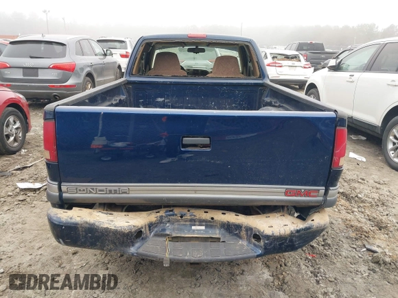 2000 GMC Sonoma SLS z VIN 1GTCS19W9Y8237166, wystawiony jako IAAI lot #41513561 z przebiegiem 177 448 mil mil oraz . Historia ofert i sprzedaży dostępna na DreamBid. Obrazek 17.