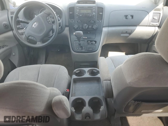 2006 Kia Sedona LX with VIN KNDMB233666057581, listed as a Copart auction lot 71027674 with 206,556 mi miles and Salvage Title. Bid and sale history available at carsss.com. Image 8.