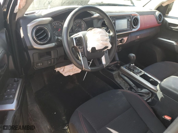 2019 Toyota Tacoma 4WD SR with VIN 3TMCZ5AN7KM213103, listed as a Copart auction lot 52088505 with 79,926 mi miles and Salvage Title. Bid and sale history available at carsss.com. Image 8.