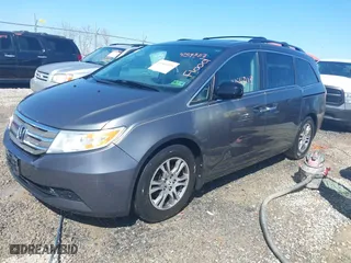2013 Honda Odyssey EX-L with VIN 5FNRL5H66DB041471, listed as a IAAI auction lot 41543113 with 171,612 mi miles. Bid and sale history available at carsss.com. Image 2.