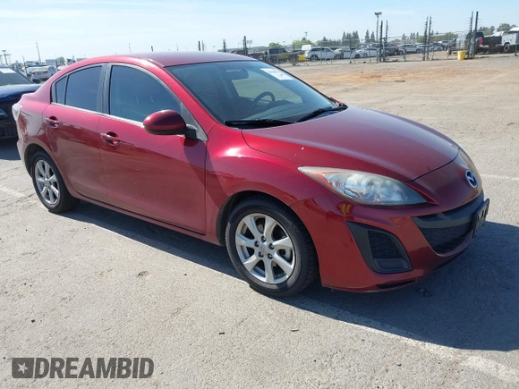 2011 Mazda 3 i Touring with VIN JM1BL1VG4B1440294, listed as a IAAI auction lot 42206976 with 183,693 mi miles. Bid and sale history available at carsss.com. Image 1.