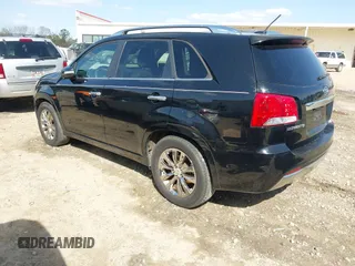 2011 Kia Sorento SX with VIN 5XYKW4A21BG160335, listed as a IAAI auction lot 41844704 with 242,375 mi miles. Bid and sale history available at carsss.com. Image 3.