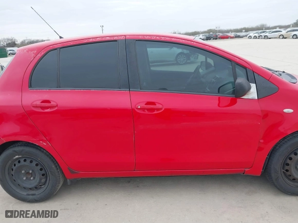 2009 Toyota Yaris with VIN JTDKT903295244022, listed as a IAAI auction lot 41615570 with 165,964 mi miles. Bid and sale history available at carsss.com. Image 13.