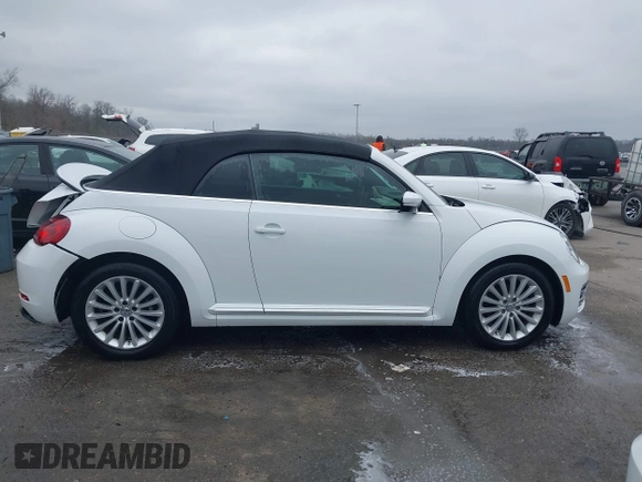 2019 Volkswagen Beetle S with VIN 3VW5DAAT4KM504847, listed as a IAAI auction lot 41582981 with 54,546 mi miles and . Bid and sale history available at DreamBid. Image 14.