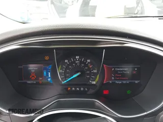 2017 Ford Fusion Hybrid Titanium z VIN 3FA6P0RU7HR300311, wystawiony jako IAAI lot #42045664 z przebiegiem 136 231 mil mil oraz . Historia ofert i sprzedaży dostępna na DreamBid. Obrazek 7.