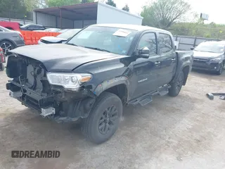 2023 Toyota Tacoma 4WD SR with VIN 3TYCZ5AN4PT170688, listed as a IAAI auction lot 41998053 with 20,770 mi miles. Bid and sale history available at carsss.com. Image 19.