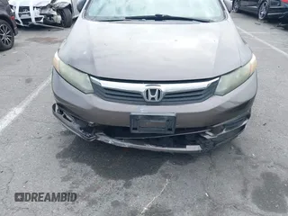 2012 Honda Civic EX with VIN 2HGFB2F89CH517330, listed as a IAAI auction lot 42116208 with 196,861 mi miles and . Bid and sale history available at DreamBid. Image 6.
