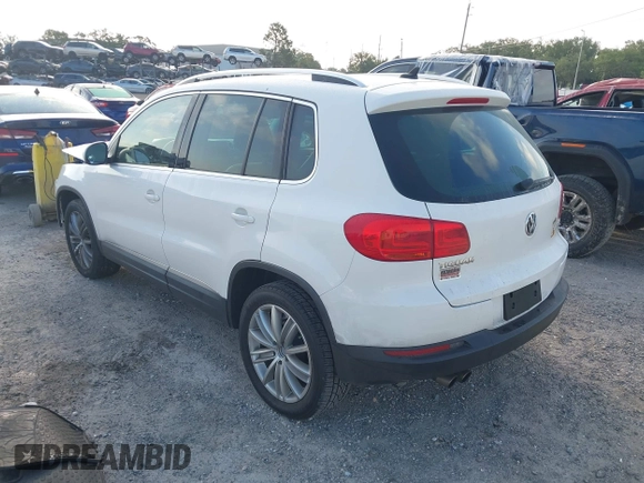 2013 Volkswagen Tiguan SE with VIN WVGAV7AX5DW545202, listed as a IAAI auction lot 42318584 with 91,556 mi miles and . Bid and sale history available at DreamBid. Image 3.