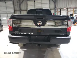 2017 Nissan Titan XD SL with VIN 1N6BA1F48HN561757, listed as a Copart auction lot 87204594 with 100,339 mi miles and Salvage Title. Bid and sale history available at carsss.com. Image 6.