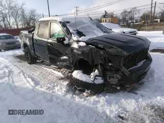 2020 Chevrolet Silverado 1500 LT Trail Boss with VIN 1GCPYFED9LZ147231, listed as a IAAI auction lot 41575194 with 90,371 mi miles. Bid and sale history available at carsss.com. Image 1.