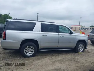 2019 GMC Yukon XL SLT z VIN 1GKS1GKC0KR242408, wystawiony jako IAAI lot #42144783 z przebiegiem Nie podano mil oraz . Historia ofert i sprzedaży dostępna na DreamBid. Obrazek 12.
