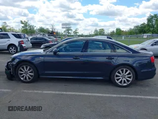 2013 Audi A6 Prestige z VIN WAUJGAFC6DN005023, wystawiony jako IAAI lot #42201985 z przebiegiem 80 337 mil mil oraz . Historia ofert i sprzedaży dostępna na DreamBid. Obrazek 14.