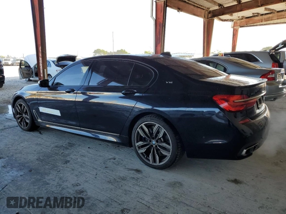 2019 BMW 7 Series M760i xDrive with VIN WBA7H6C55KG614986, listed as a Copart auction lot 84023164 with 59,222 mi miles and Non Repairable. Bid and sale history available at carsss.com. Image 2.