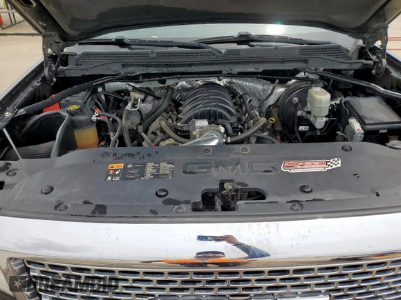 2015 GMC Sierra 1500 Denali z VIN 3GTU2WEC2FG466258, wystawiony jako Copart lot #56240285 z przebiegiem 118 487 mil mil oraz Szkoda całkowita • Salvage title. Historia ofert i sprzedaży dostępna na DreamBid. Obrazek 11.
