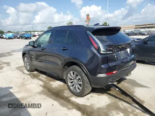 2022 Cadillac XT4 FWD Sport with VIN 1GYFZER46NF119009, listed as a Copart auction lot 57651725 with 37,896 mi miles and Salvage title. Bid and sale history available at DreamBid. Image 2.
