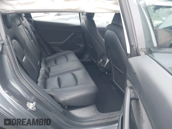 2023 Tesla Model 3 with VIN 5YJ3E1EA4PF705949, listed as a IAAI auction lot 42336682 with 88,056 mi miles and . Bid and sale history available at DreamBid. Image 8.