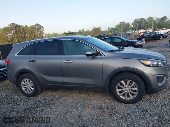 2017 Kia Sorento LX z VIN 5XYPG4A36HG259429, wystawiony jako IAAI lot #41948637 z przebiegiem 150 151 mil mil oraz . Historia ofert i sprzedaży dostępna na DreamBid. Obrazek 13.