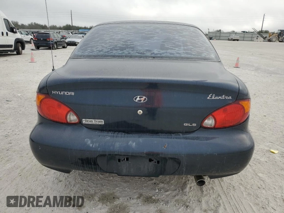 2000 Hyundai Elantra GLS z VIN KMHJF35F9YU032902, wystawiony jako Copart lot #45145955 z przebiegiem 79 229 mil mil oraz Czysty tytuł • Clean title. Historia ofert i sprzedaży dostępna na DreamBid. Obrazek 6.