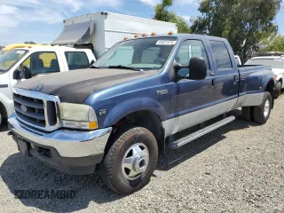 2004 Ford F-350 with VIN 1FTWW33S24EB22584, listed as a Copart auction lot 63521575 with Not provided miles and Salvage title. Bid and sale history available at DreamBid. Image 1.