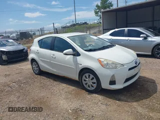 2012 Toyota Prius One z VIN JTDKDTB36C1009273, wystawiony jako IAAI lot #42454213 z przebiegiem 227 913 mil mil oraz . Historia ofert i sprzedaży dostępna na DreamBid. Obrazek 1.