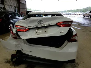 2020 Toyota Camry LE with VIN 4T1C11AK1LU878853, listed as a Copart auction lot 51052405 with 143,380 mi miles and Salvage Title. Bid and sale history available at carsss.com. Image 6.