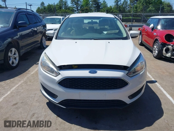 2017 Ford Focus SE with VIN 1FADP3F29HL234323, listed as a IAAI auction lot 42143821 with 138,860 mi miles. Bid and sale history available at carsss.com. Image 6.